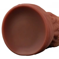 Dildo În Formă De Limbă Platinum 25cm – Strat Dublu Maro